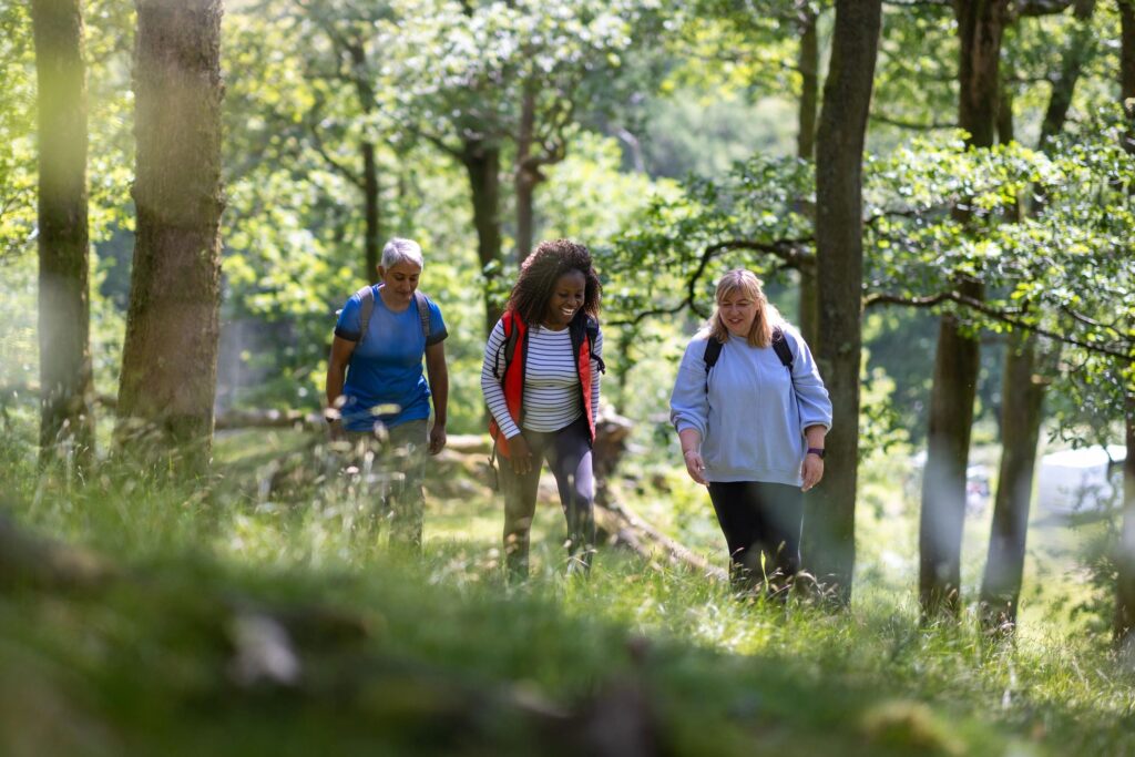 Friends Enjoying Catching Up While Hiking